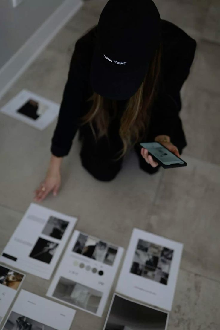 Arranging printed moodboard images on the floor